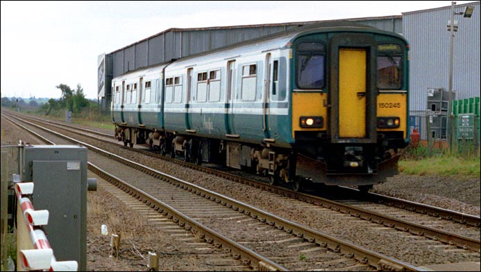 Anglia class 150245 at Funthams Lane at Kings Dyke in 2003