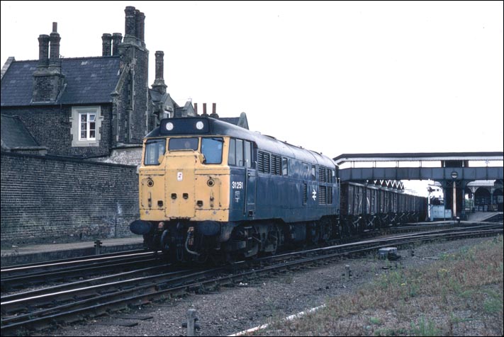 Class 31251 on a freight of 16ton mineral wagons