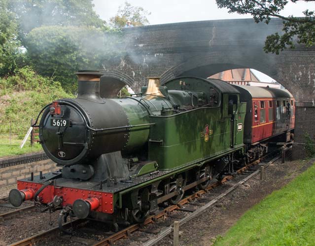 GWR 0-6-2T no.5619 leaves Weybourne station 