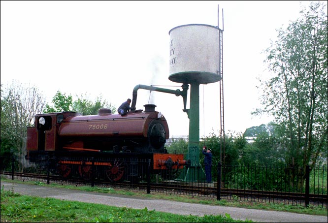 Austerity 0-6-0ST no.75006 filling up with water at the Nene Valley's Peterborough station 
