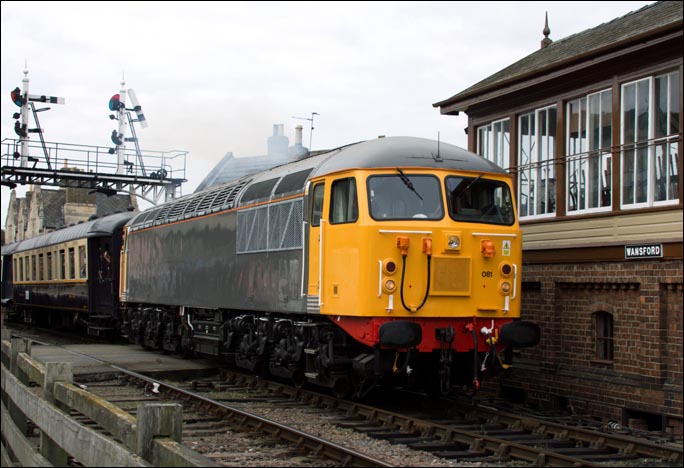 Class 56081 leaving in Wansford station past Wansford signal box at Nene Valley Railway on Saturday the 27th September 2014 