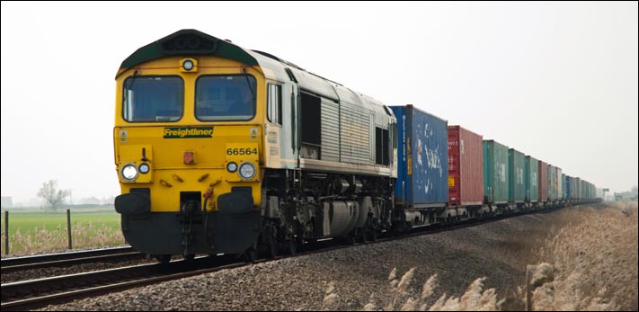 Freightliner class 66564 heading for March at Turves on 29th March 2011 