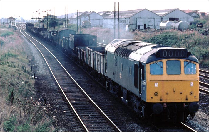 Class 25 270 on a mixed freight of empty wagons at Wellingborough