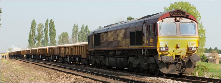 DB Schenker Rail class 66025 at Whittlesea heading to Peterborough  in 2011. 