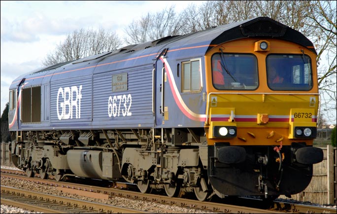 GBRf class 66732 with the name "GBRF The First Decade 1999 2009 John Smith-MD"