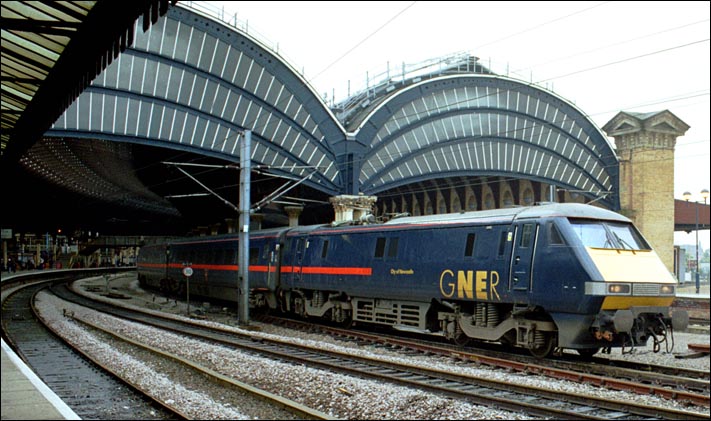 GNER class 91130 City of Newcastle leaves York station in 2004 