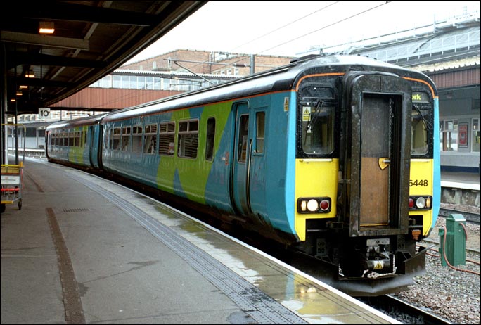 Class 156488 in platform 10 at York in 2004 