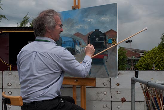 Artist painting Tornado at Railfest at the NRM at York 